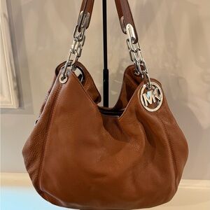 Michael Kors Tan Leather Shoulder Bag with Silver Accents. SOLD